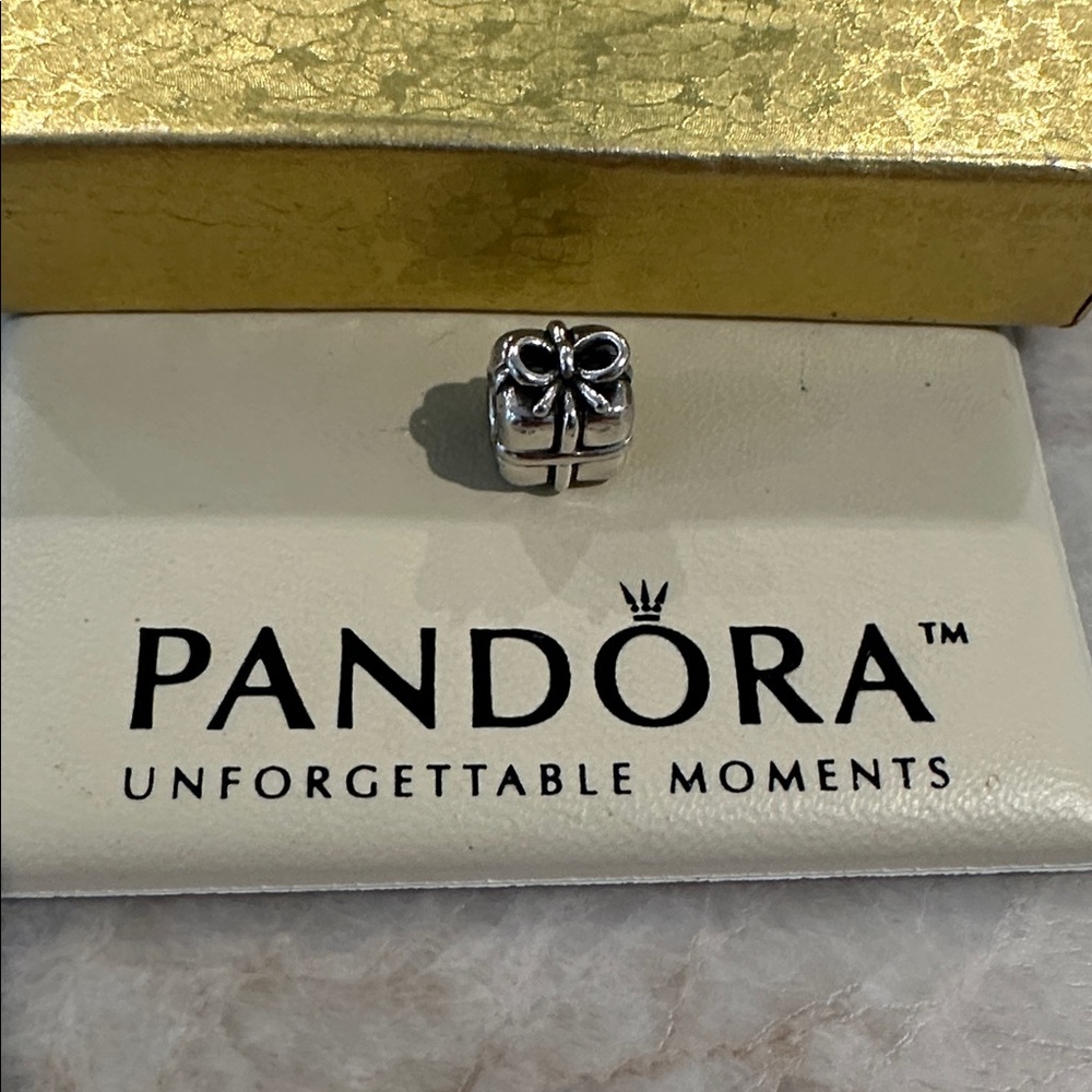 Pandora Silver charm. Adorable gift box w/ bow on top.